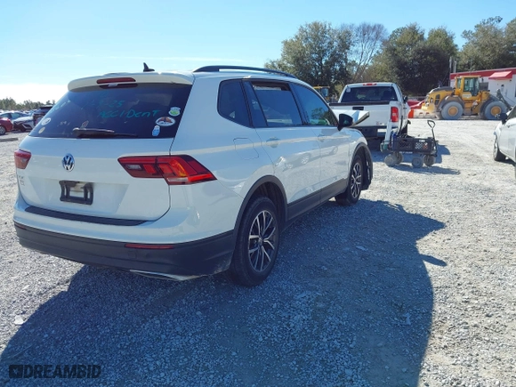 2021 Volkswagen Tiguan S with VIN 3VV1B7AX9MM056025, listed as a IAAI auction lot 41352521 with 98,944 mi miles. Bid and sale history available at carsss.com. Image 4.