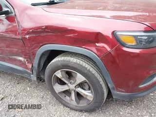 2019 Jeep Cherokee Limited with VIN 1C4PJMDX3KD235353, listed as a IAAI auction lot 42356341 with 104,109 mi miles and . Bid and sale history available at DreamBid. Image 6.