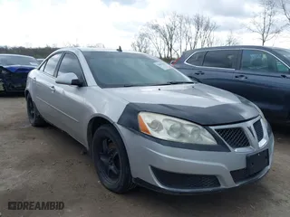 2010 Pontiac G6 w/1SA with VIN 1G2ZA5E02A4154217, listed as a IAAI auction lot 42065310 with 193,317 mi miles. Bid and sale history available at carsss.com. Image 1.