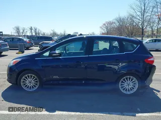 2016 Ford C-Max Energi SEL with VIN 1FADP5CU9GL102758, listed as a IAAI auction lot 41989630 with 103,410 mi miles. Bid and sale history available at carsss.com. Image 14.