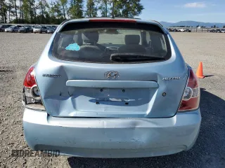 2007 Hyundai Accent SE z VIN KMHCN36CX7U048587, wystawiony jako Copart lot #59305325 z przebiegiem 85 492 mil mil oraz Szkoda całkowita • Salvage title. Historia ofert i sprzedaży dostępna na DreamBid. Obrazek 6.