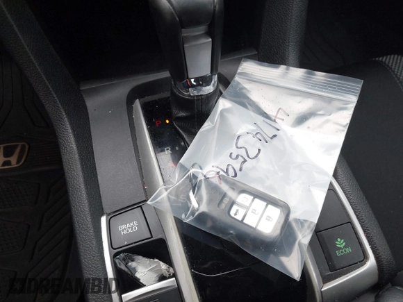 2021 Honda Civic Sport with VIN 2HGFC2F87MH554620, listed as a IAAI auction lot 41743596 with 52,327 mi miles and . Bid and sale history available at DreamBid. Image 11.