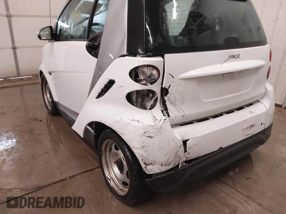 2015 Smart fortwo Passion z VIN WMEEJ3BA2FK790569, wystawiony jako IAAI lot #41598759 z przebiegiem 78 307 mil mil oraz . Historia ofert i sprzedaży dostępna na DreamBid. Obrazek 6.