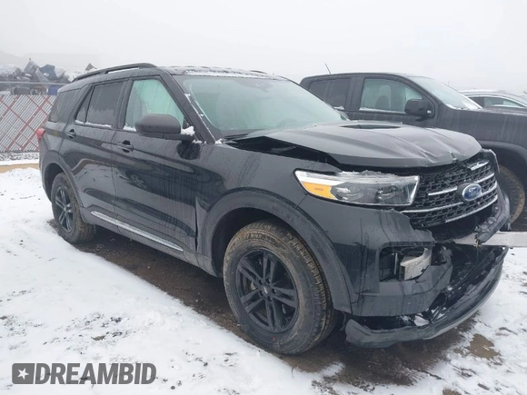 2021 Ford Explorer XLT with VIN 1FMSK8DH0MGA59737, listed as a IAAI auction lot 41474554 with 74,536 mi miles. Bid and sale history available at carsss.com. Image 1.
