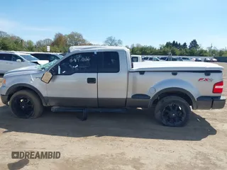 2005 Ford F-150 XLT with VIN 1FTPX04545KB65979, listed as a IAAI auction lot 42147536 with 188,655 mi miles and . Bid and sale history available at DreamBid. Image 14.
