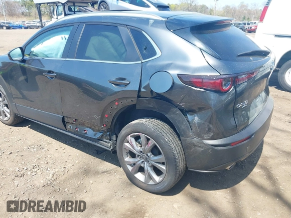 2024 Mazda CX-30 S Carbon Edition z VIN 3MVDMBCM0RM662752, wystawiony jako IAAI lot #42108251 z przebiegiem 17 963 mil mil oraz . Historia ofert i sprzedaży dostępna na DreamBid. Obrazek 6.