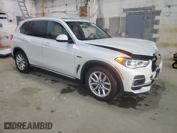 2022 BMW X5 xDrive45e with VIN 5UXTA6C02N9L87936, listed as a Copart auction lot 52728515 with 22,228 mi miles and Salvage Title. Bid and sale history available at carsss.com. Image 4.
