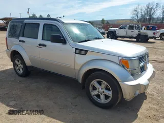 2008 Dodge Nitro SXT z VIN 1D8GT28K48W163882, wystawiony jako IAAI lot #41745017 z przebiegiem 239 287 mil mil oraz . Historia ofert i sprzedaży dostępna na DreamBid. Obrazek 1.