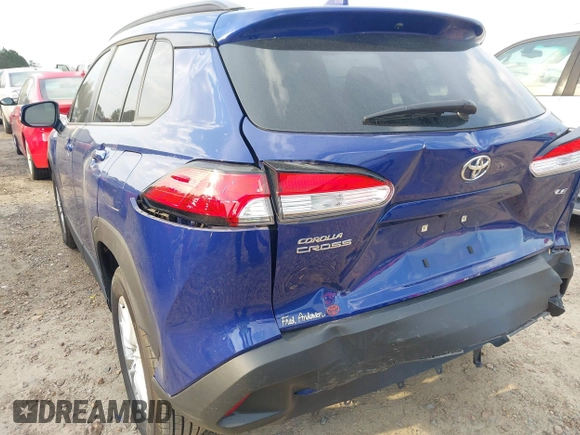 2022 Toyota Corolla Cross LE z VIN 7MUCAAAG6NV018136, wystawiony jako IAAI lot #41863545 z przebiegiem 40 239 mil mil oraz . Historia ofert i sprzedaży dostępna na DreamBid. Obrazek 6.