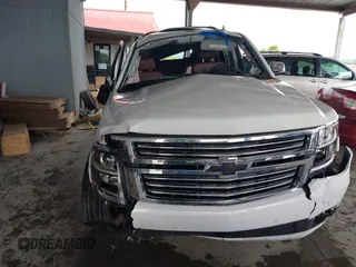 2019 Chevrolet Suburban Premier with VIN 1GNSKJKJ2KR354283, listed as a IAAI auction lot 39548082 with Not Provided miles and . Bid and sale history available at DreamBid. Image 12.