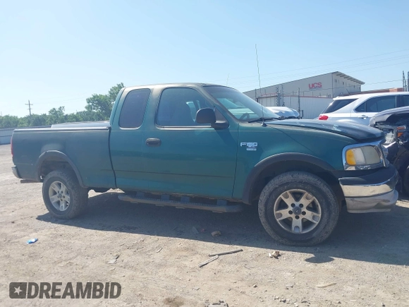 1999 Ford F-150 XL z VIN 2FTRX18L9XCA01139, wystawiony jako IAAI lot #42550053 z przebiegiem 263 950 mil mil oraz . Historia ofert i sprzedaży dostępna na DreamBid. Obrazek 13.
