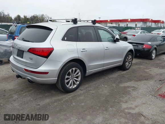 2013 Audi Q5 Premium with VIN WA1CFAFP7DA070577, listed as a IAAI auction lot 42021724 with 142,449 mi miles. Bid and sale history available at carsss.com. Image 4.