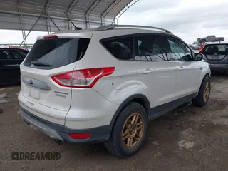 2015 Ford Escape Titanium z VIN 1FMCU0J91FUA27610, wystawiony jako IAAI lot #42095995 z przebiegiem 122 521 mil mil oraz . Historia ofert i sprzedaży dostępna na DreamBid. Obrazek 4.
