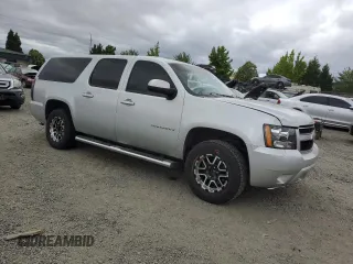2013 Chevrolet Suburban LS with VIN 1GNSKHE77DR311408, listed as a Copart auction lot 59977394 with 216,161 mi miles and Salvage Title. Bid and sale history available at carsss.com. Image 4.