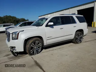 2019 GMC Yukon Denali with VIN 1GKS2CKJ1KR310963, listed as a Copart auction lot 75862254 with 102,602 mi miles and Salvage Title. Bid and sale history available at carsss.com. Image 1.