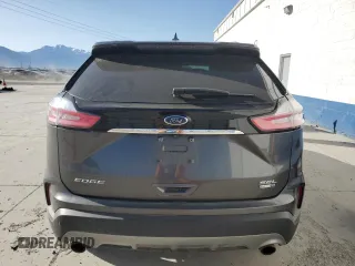 2020 Ford Edge SEL z VIN 2FMPK4J97LBA46310, wystawiony jako Copart lot #56177805 z przebiegiem 97 180 mil mil oraz Szkoda całkowita • Salvage title. Historia ofert i sprzedaży dostępna na DreamBid. Obrazek 6.