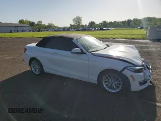 2015 BMW 2 Series 228i with VIN WBA1K5C51FV474079, listed as a Copart auction lot 57457875 with 62,946 mi miles and Salvage title. Bid and sale history available at DreamBid. Image 4.