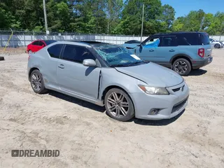 2012 Scion tC z VIN JTKJF5C70C3038591, wystawiony jako IAAI lot #42337910 z przebiegiem 191 646 mil mil oraz . Historia ofert i sprzedaży dostępna na DreamBid. Obrazek 1.