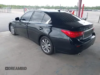 2015 Infiniti Q50 Premium with VIN JN1BV7AR1FM390739, listed as a IAAI auction lot 41865581 with 172,326 mi miles and . Bid and sale history available at DreamBid. Image 3.