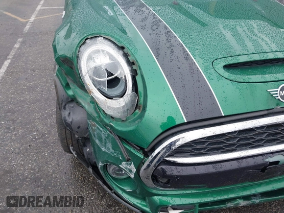 2020 MINI Hardtop Cooper S z VIN WMWXR5C08L2L85651, wystawiony jako IAAI lot #41521346 z przebiegiem 40 863 mil mil oraz . Historia ofert i sprzedaży dostępna na DreamBid. Obrazek 6.