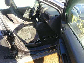 2011 Jeep Compass with VIN 1J4NF1FB8BD159017, listed as a IAAI auction lot 41658701 with 172,424 mi miles. Bid and sale history available at carsss.com. Image 5.