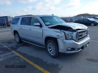 2015 GMC Yukon XL SLT z VIN 1GKS2HKCXFR618783, wystawiony jako IAAI lot #42081053 z przebiegiem 230 368 mil mil oraz . Historia ofert i sprzedaży dostępna na DreamBid. Obrazek 1.