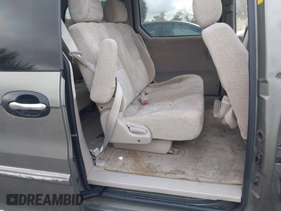 2004 Kia Sedona LX with VIN KNDUP131346533373, listed as a IAAI auction lot 41632342 with 76,545 mi miles. Bid and sale history available at carsss.com. Image 8.