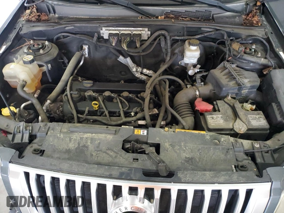 2009 Mercury Mariner Premier z VIN 4M2CU877X9KJ14960, wystawiony jako Copart lot #62951805 z przebiegiem 131 255 mil mil oraz Szkoda całkowita • Salvage title. Historia ofert i sprzedaży dostępna na DreamBid. Obrazek 12.