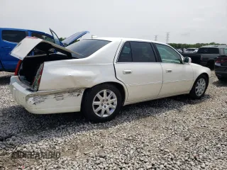 2009 Cadillac DTS 1SC z VIN 1G6KD57Y99U141826, wystawiony jako Copart lot #56242094 z przebiegiem 107 960 mil mil oraz Szkoda całkowita • Salvage title. Historia ofert i sprzedaży dostępna na DreamBid. Obrazek 3.