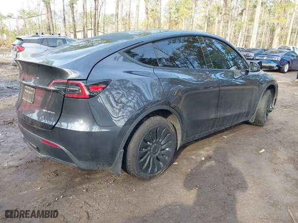 2024 Tesla Model Y Long Range with VIN 7SAYGDEE4RA271362, listed as a IAAI auction lot 41650528 with 13,005 mi miles. Bid and sale history available at carsss.com. Image 4.