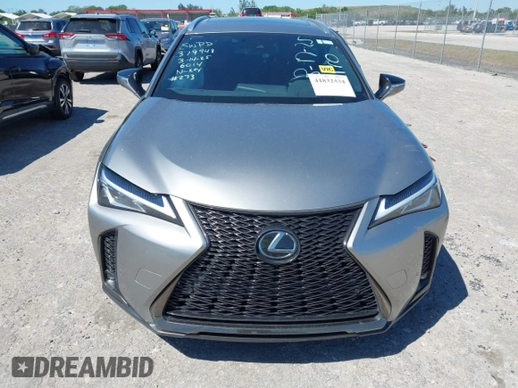 2022 Lexus UX 200 F Sport z VIN JTHE3JBH3N2056014, wystawiony jako IAAI lot #41832434 z przebiegiem 25 693 mil mil oraz . Historia ofert i sprzedaży dostępna na DreamBid. Obrazek 13.