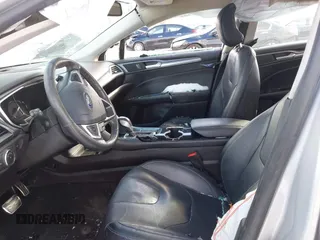 2016 Ford Fusion Titanium with VIN 3FA6P0K96GR101285, listed as a IAAI auction lot 41214633 with 113,633 mi miles and . Bid and sale history available at carsss.com. Image 5.