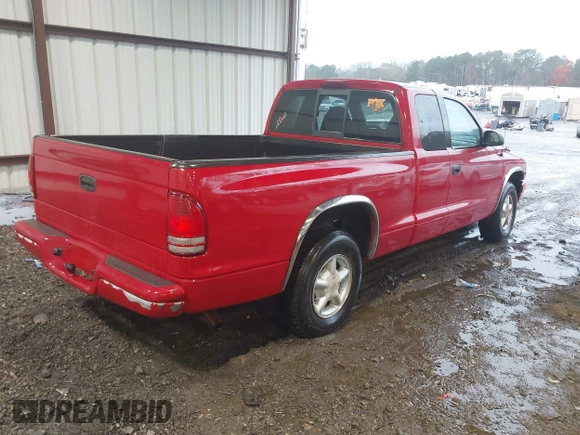 1998 Dodge Dakota SLT with VIN 1B7GL22X2WS691119, listed as a IAAI auction lot 41056451 with 219,224 mi miles. Bid and sale history available at carsss.com. Image 4.
