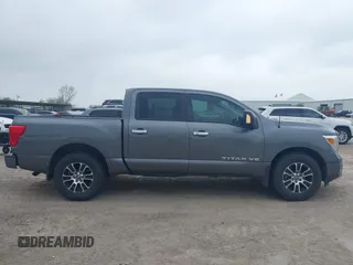 2020 Nissan Titan Platinum Reserve with VIN 1N6AA1EF1LN503027, listed as a IAAI auction lot 41937860 with 88,250 mi miles and . Bid and sale history available at DreamBid. Image 13.