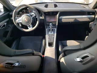 2015 Porsche 911 GT3 z VIN WP0AC2A93FS183704, wystawiony jako Copart lot #76139704 z przebiegiem 33 935 mil mil oraz Szkoda całkowita • Salvage title. Historia ofert i sprzedaży dostępna na DreamBid. Obrazek 8.