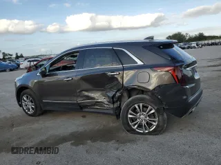 2020 Cadillac XT5 Premium Luxury FWD with VIN 1GYKNCRSXLZ126926, listed as a Copart auction lot 51703605 with 146,576 mi miles and Salvage Title. Bid and sale history available at carsss.com. Image 2.