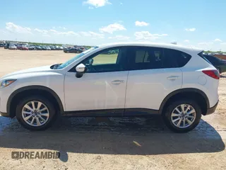 2016 Mazda CX-5 Touring z VIN JM3KE2CY0G0840918, wystawiony jako IAAI lot #42205529 z przebiegiem 74 515 mil mil oraz . Historia ofert i sprzedaży dostępna na DreamBid. Obrazek 14.