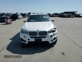 2017 BMW X5 xDrive50i with VIN 5UXKR6C32H0U13460, listed as a Copart auction lot 51462745 with 97,749 mi miles and Salvage title. Bid and sale history available at DreamBid. Image 12.