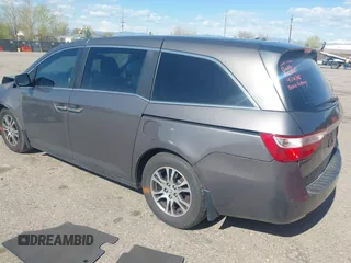 2012 Honda Odyssey EX-L with VIN 5FNRL5H61CB095789, listed as a IAAI auction lot 42065507 with 138,570 mi miles and . Bid and sale history available at DreamBid. Image 3.