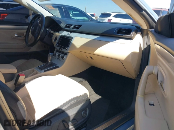 2013 Volkswagen CC Sport with VIN WVWBP7AN0DE567504, listed as a IAAI auction lot 42003695 with 174,528 mi miles. Bid and sale history available at carsss.com. Image 5.