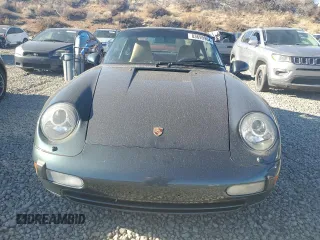 1996 Porsche 911 with VIN WP0DA2996TS385231, listed as a Copart auction lot 83699964 with 60,492 mi miles and Salvage title. Bid and sale history available at DreamBid. Image 5.