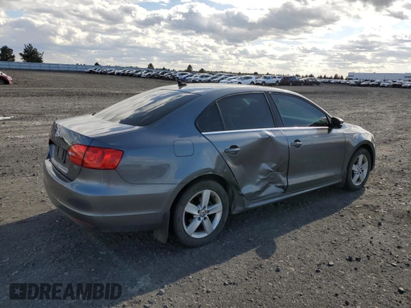 2014 Volkswagen Jetta TDI w/Premium with VIN 3VW3L7AJ4EM273755, listed as a Copart auction lot 52389795 with 184,586 mi miles and Salvage title. Bid and sale history available at DreamBid. Image 3.