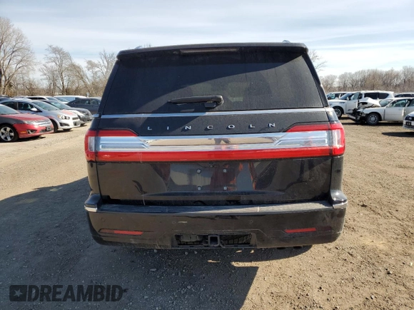 2020 Lincoln Navigator Reserve z VIN 5LMJJ2LT2LEL09441, wystawiony jako Copart lot #50593575 z przebiegiem 59 347 mil mil oraz Szkoda całkowita • Salvage title. Historia ofert i sprzedaży dostępna na DreamBid. Obrazek 6.
