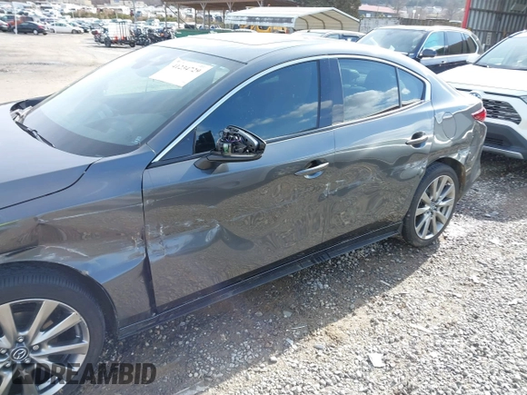 2023 Mazda 3 S Premium with VIN 3MZBPBDM8PM373434, listed as a IAAI auction lot 41234729 with 9,387 mi miles and . Bid and sale history available at DreamBid. Image 6.