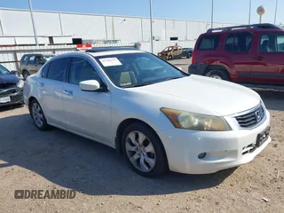 2009 Honda Accord EX-L with VIN 1HGCP36889A049401, listed as a IAAI auction lot 41241557 with 123,990 mi miles and . Bid and sale history available at DreamBid. Image 1.