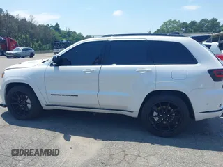 2019 Jeep Grand Cherokee Summit with VIN 1C4RJFJT1KC785744, listed as a IAAI auction lot 42645006 with 38,483 mi miles and . Bid and sale history available at DreamBid. Image 14.