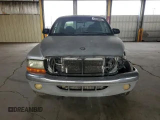 2002 Dodge Dakota SLT z VIN 1B7HL48N42S519724, wystawiony jako Copart lot #55533895 z przebiegiem 313 644 mil mil oraz Tytuł czysty. Historia ofert i sprzedaży dostępna na DreamBid. Obrazek 5.