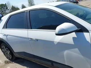 2024 Hyundai Ioniq 5 SE z VIN KM8KM4DE8RU300381, wystawiony jako IAAI lot #41907767 z przebiegiem 17 452 mil mil oraz . Historia ofert i sprzedaży dostępna na DreamBid. Obrazek 13.