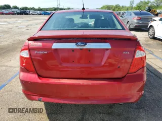 2012 Ford Fusion SEL with VIN 3FAHP0JA1CR348647, listed as a Copart auction lot 61761545 with 65,456 mi miles and Salvage title. Bid and sale history available at DreamBid. Image 6.