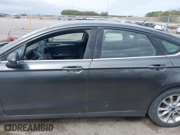 2017 Ford Fusion SE with VIN 3FA6P0H7XHR228922, listed as a IAAI auction lot 42162345 with 186,000 mi miles and . Bid and sale history available at DreamBid. Image 14.